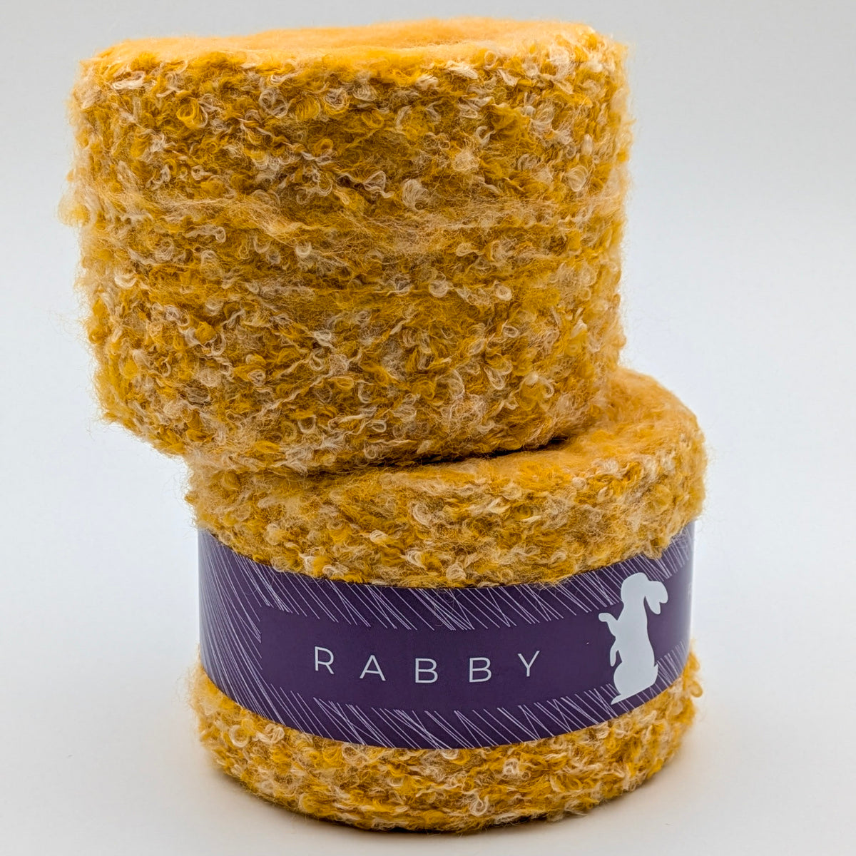 Bouclé Garn Crown mit Wolle in Gelb – RABBY, weitere Ansicht
