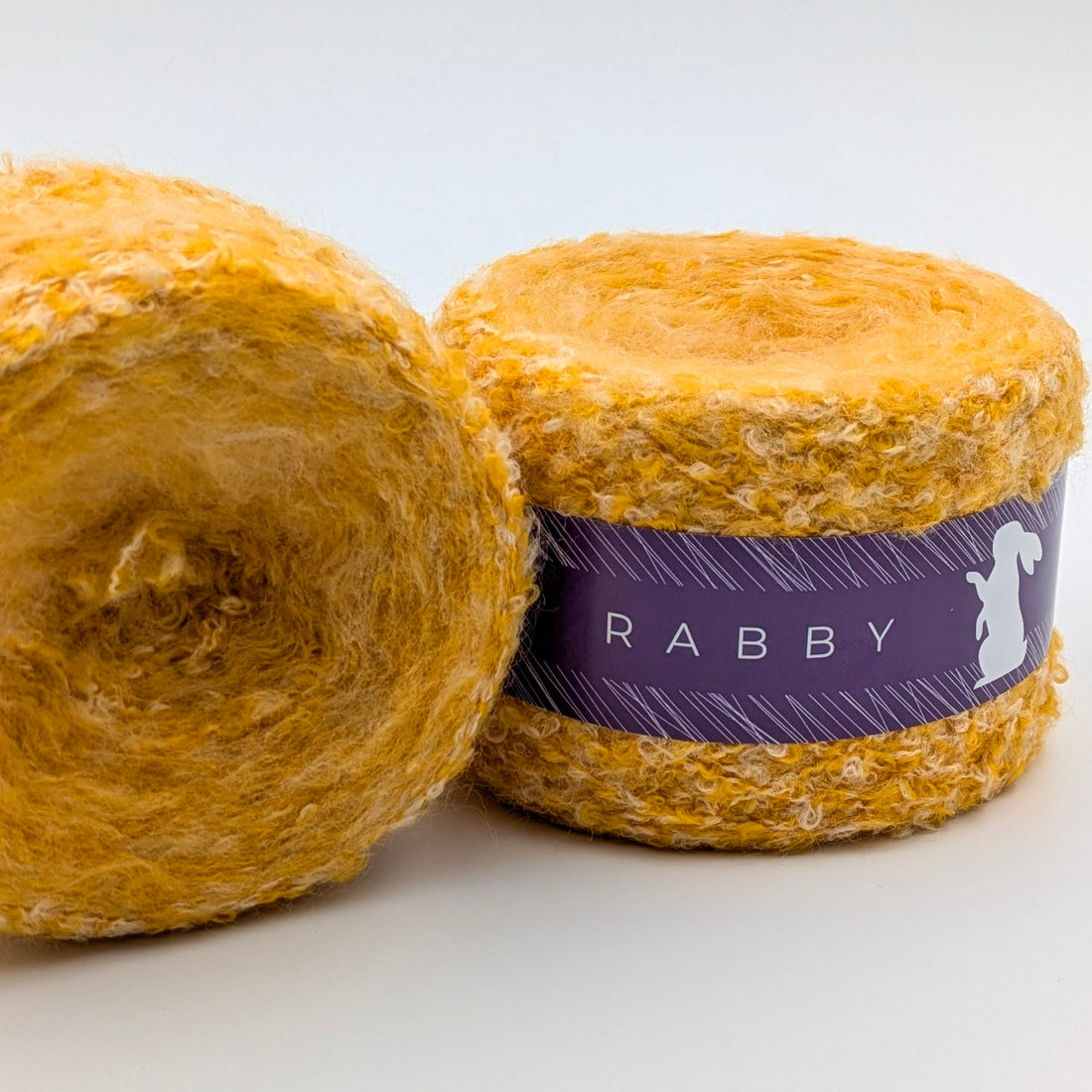 Bouclé Garn Crown mit Wolle in Gelb – RABBY, weitere Ansicht
