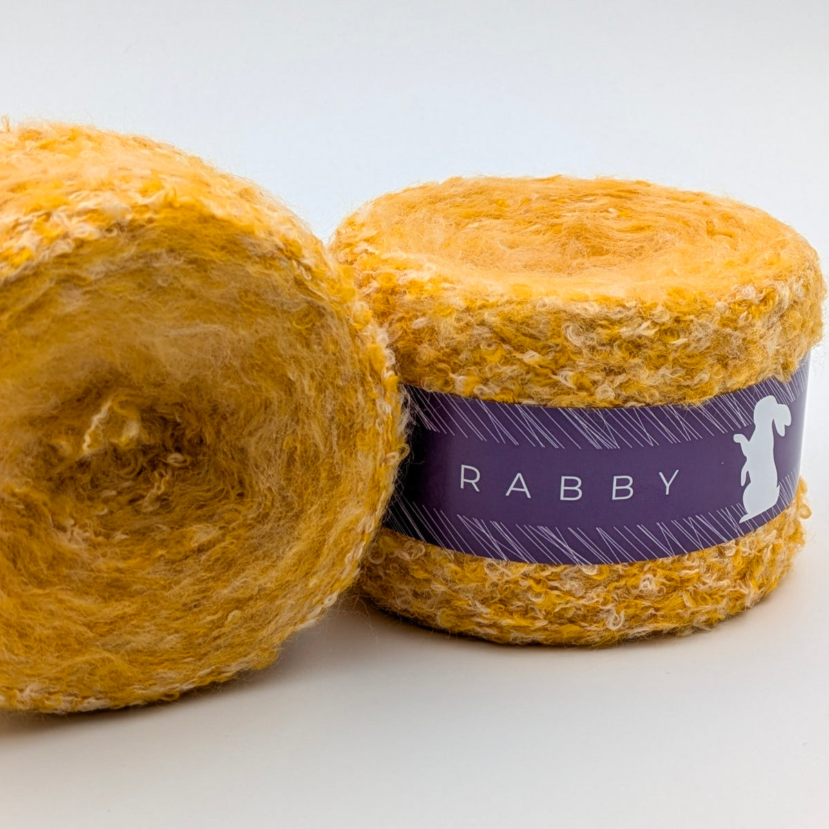 Bouclé Garn Crown mit Wolle in Gelb – RABBY, weitere Ansicht