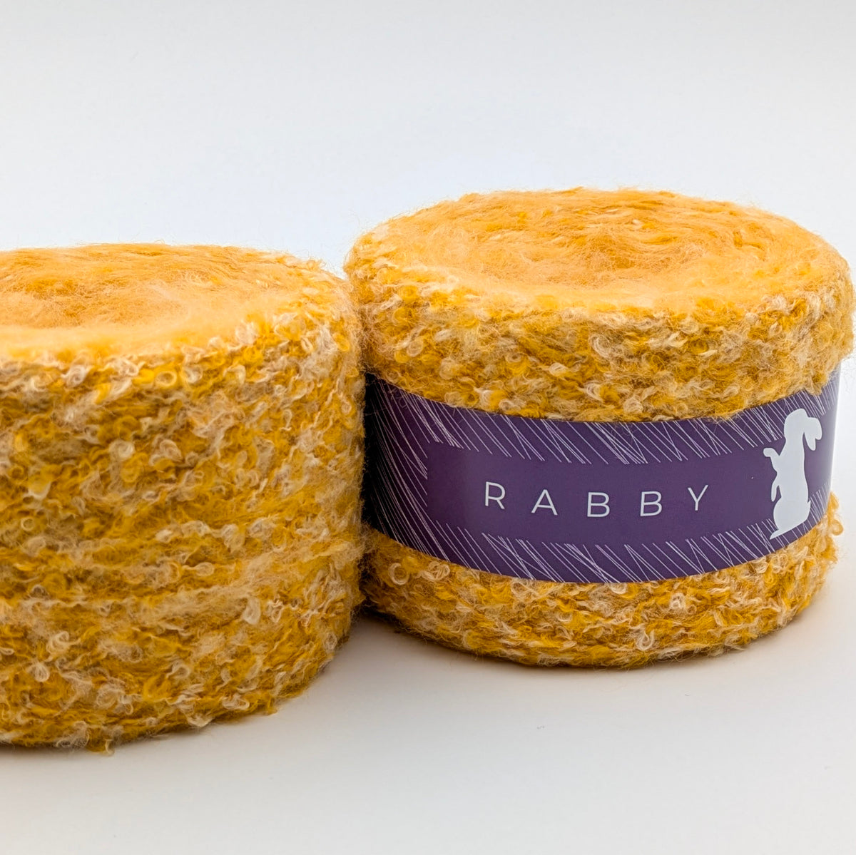 Bouclé Garn Crown mit Wolle in Gelb – RABBY, weitere Ansicht